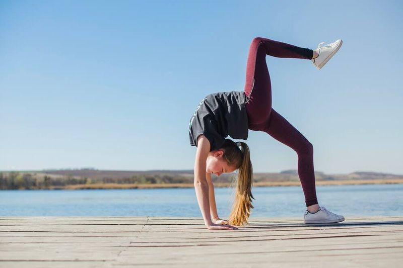 a flexible girl stretching