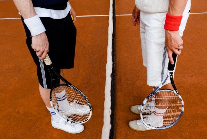 two tennis players wearing sweatbands