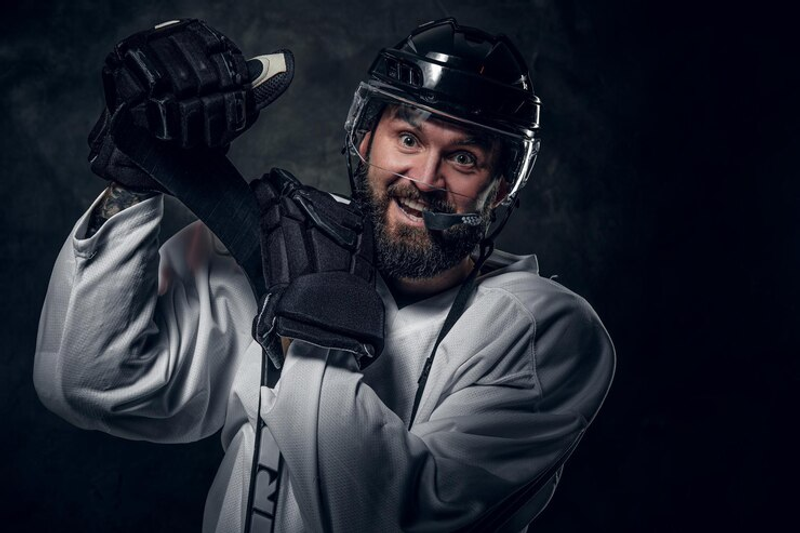 a hockey player wearing hockey gloves