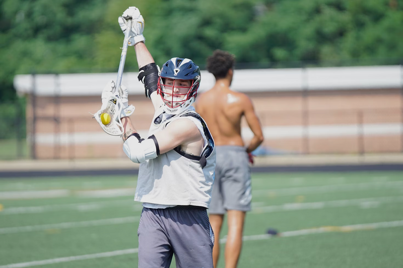 a male lacrosse player at lacrosse training