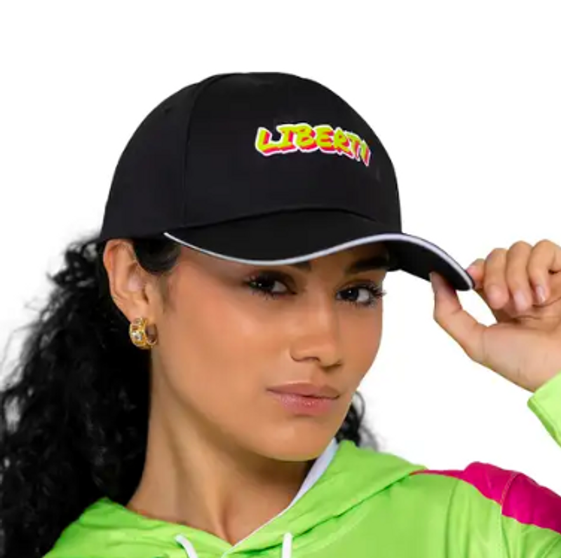 an adult female donning a personalized baseball cap