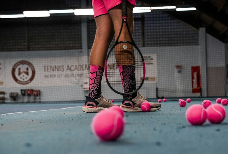 tennis player practicing tennis