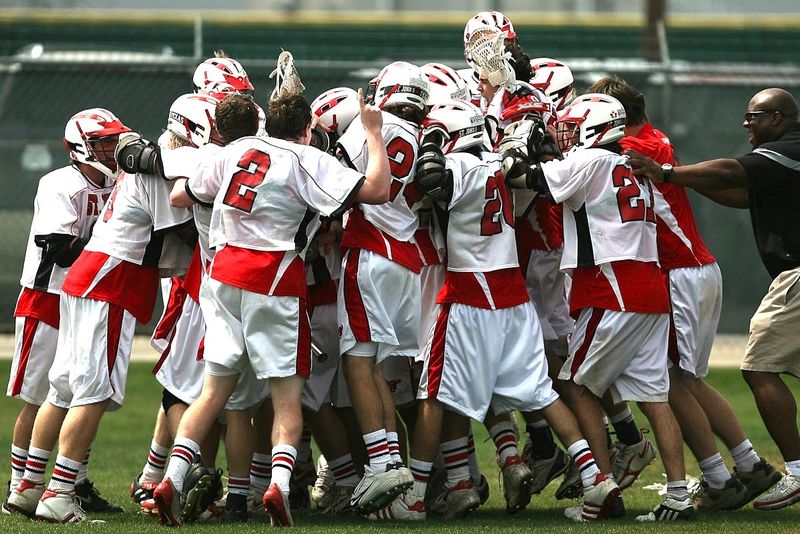 football players in a huddle