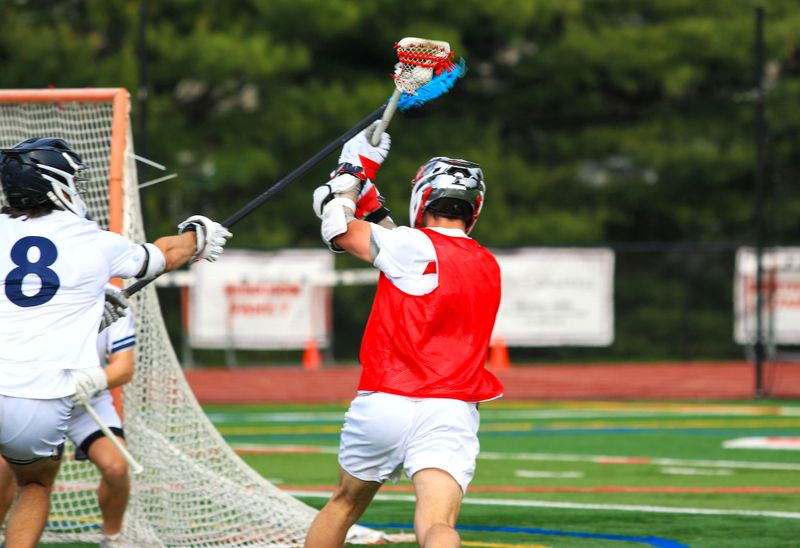 a lacrosse player about to take a shot
