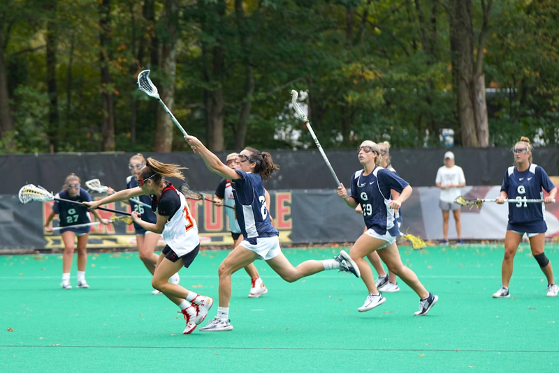 a youth lacrosse team playing lacrosse