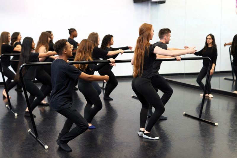a group of adults at ballet class