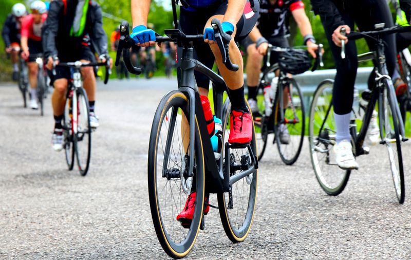a group of cyclists on a road