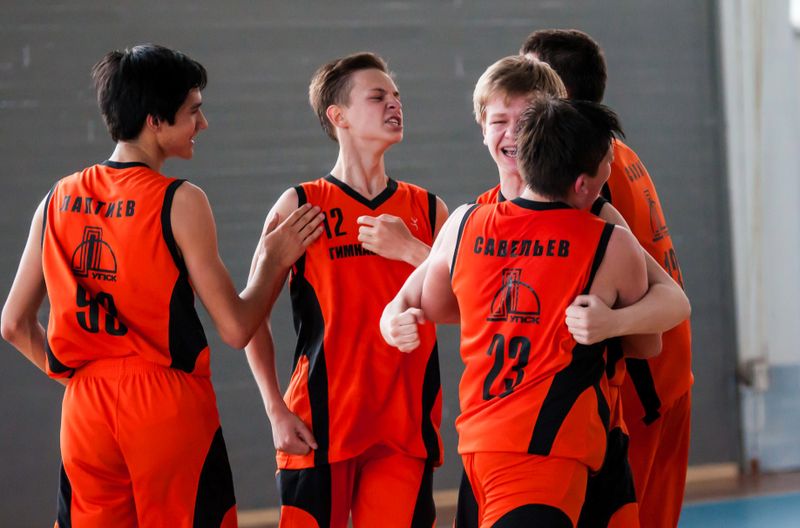 a youth boys basketball team during a basketball game