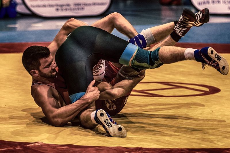 wrestlers engaging in floor movements