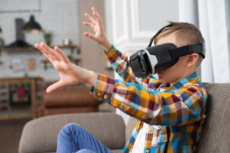 child wearing a VR headset