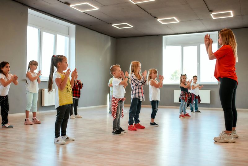 a kids dance class in a dance studio