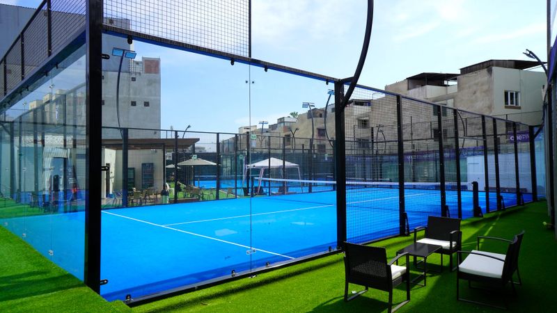 a blue outdoor padel court
