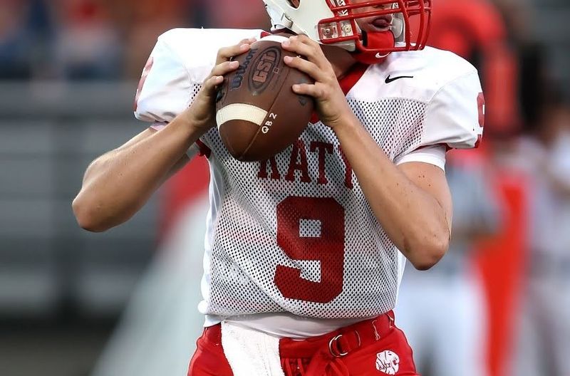 football player wearing a rib protector