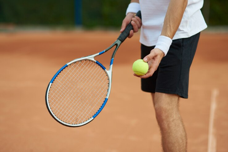 a tennis player about to serve