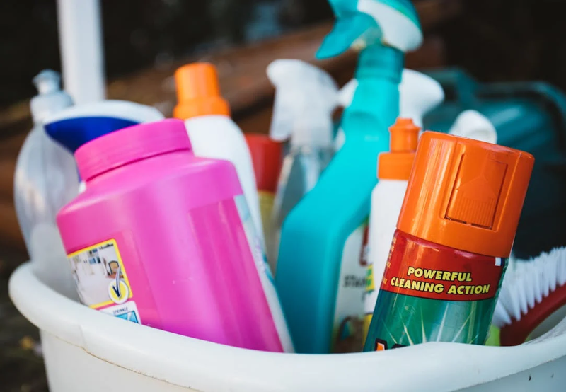 a bucket of cleaning supplies