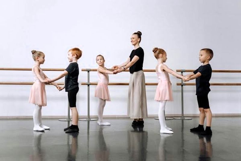 a kids dance class with an adult tutor