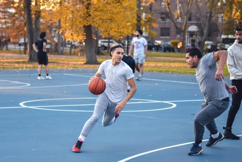 Basketball player dribbling a basketball