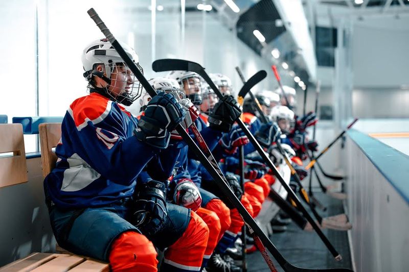 a youth hockey team on the bench