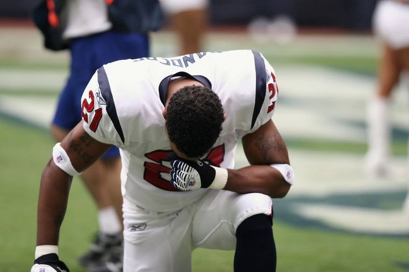 football player wearing shoulder pads