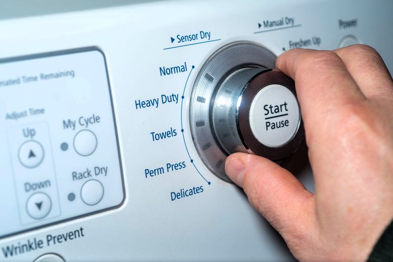 a close up of the cycle options on a washing machine
