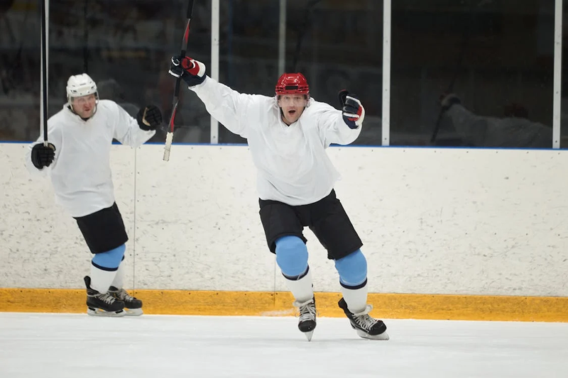 ice hockey players celebrating 