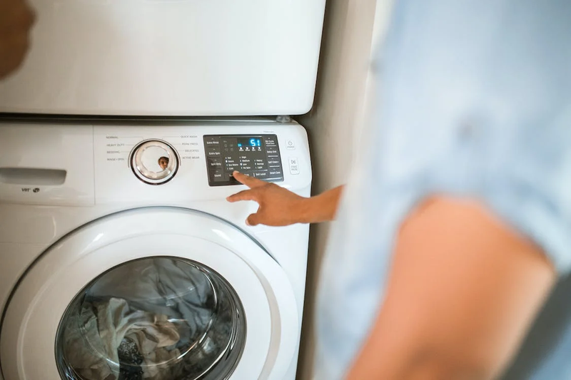 man doing laundry